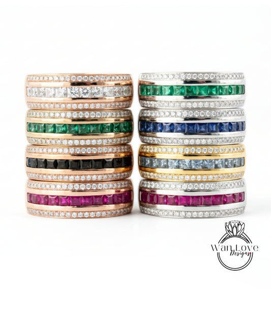 A collection of rings with various gemstones and designs, including diamonds and colored stones, arranged in a visually appealing manner.