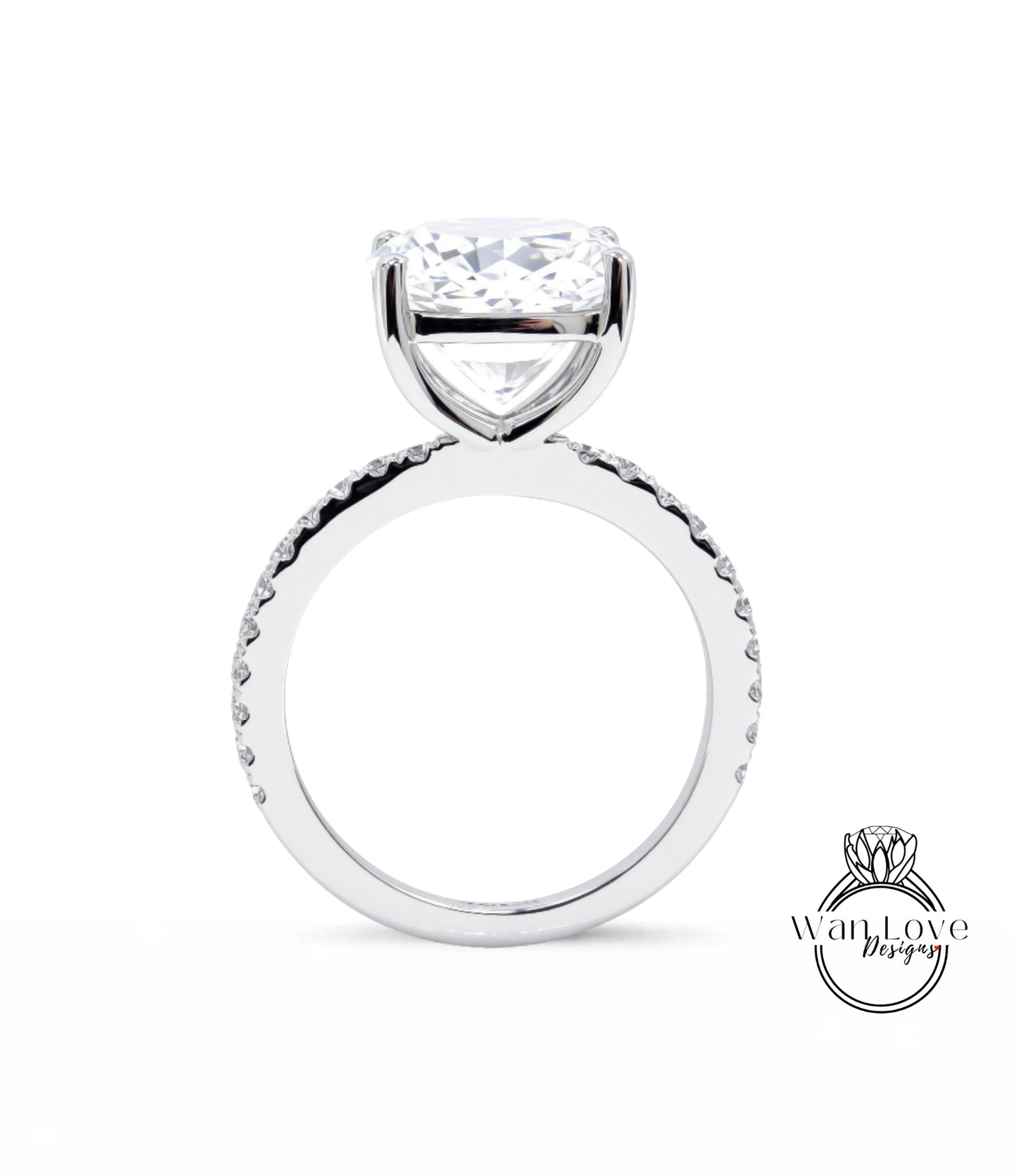 A large, clear diamond engagement ring with a large central diamond and a smaller diamond band around the base.
