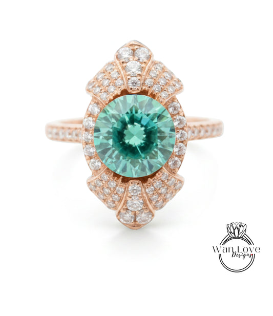 a beautiful ring with a large, round, green gemstone at the center, surrounded by a decorative design with numerous small diamonds.
