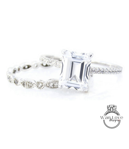 A close-up view of a diamond engagement ring with a large, clear gemstone set in a silver band.