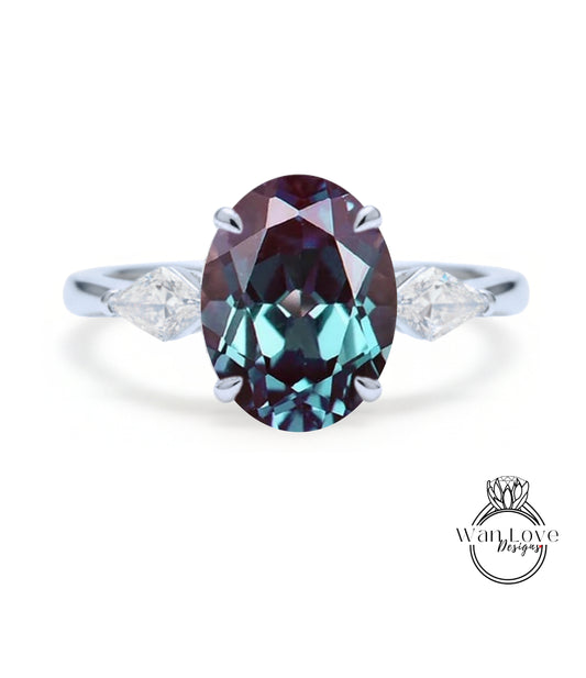 A ring featuring a large oval-shaped gemstone surrounded by smaller diamonds.