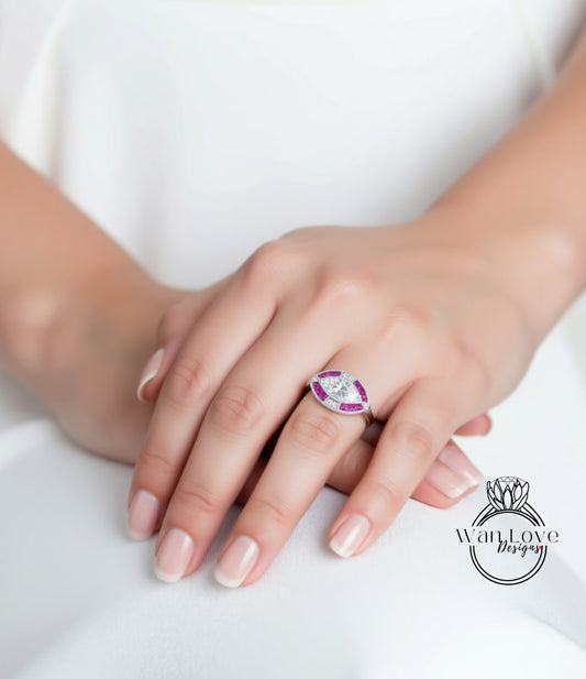 A close-up of a person's hand wearing a ring with a large central gemstone surrounded by smaller stones.