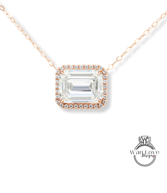 A necklace with a large, clear gemstone set in a halo of smaller diamonds.