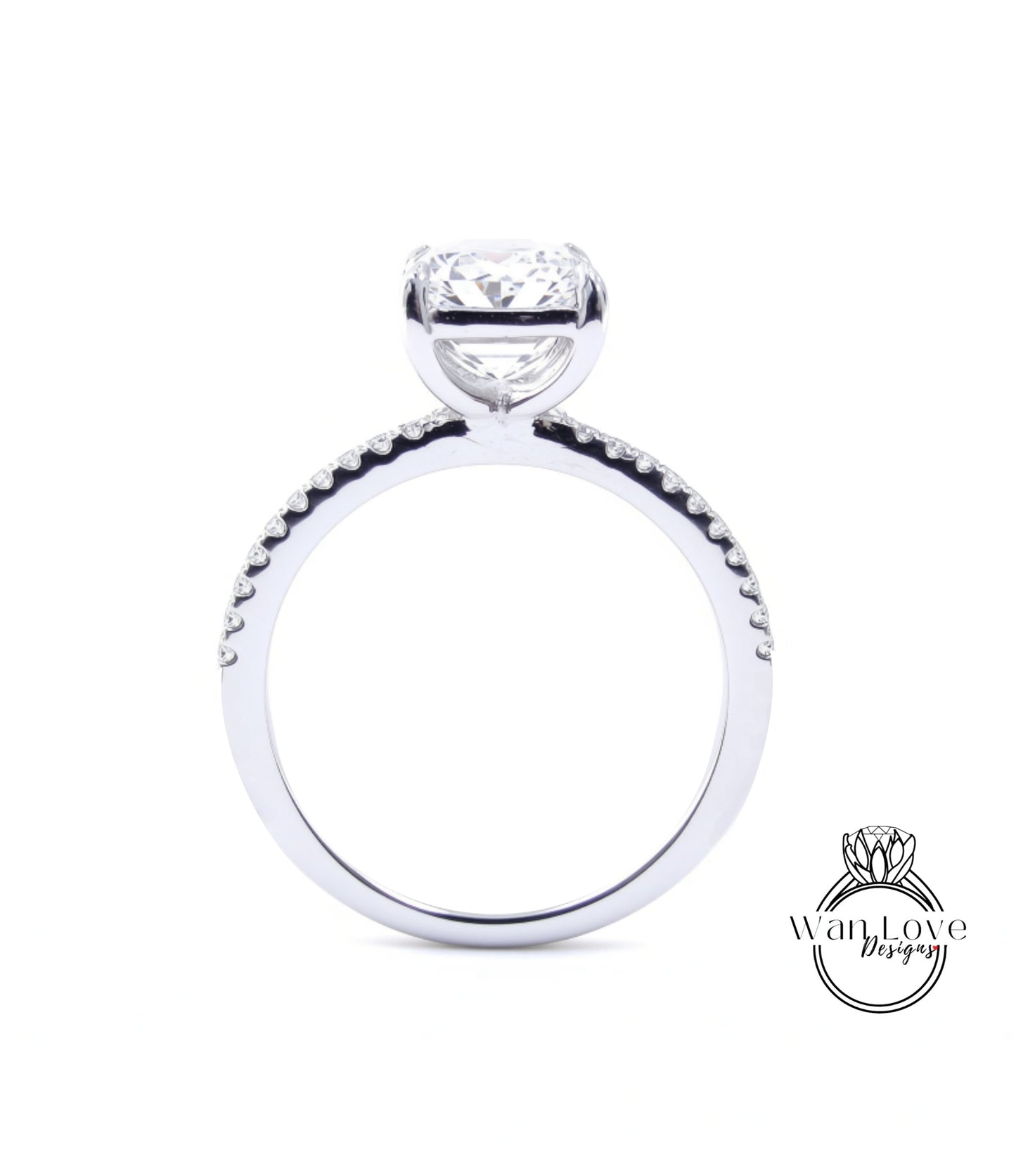 A close-up view of a diamond engagement ring with a large central diamond and smaller diamonds around the band.