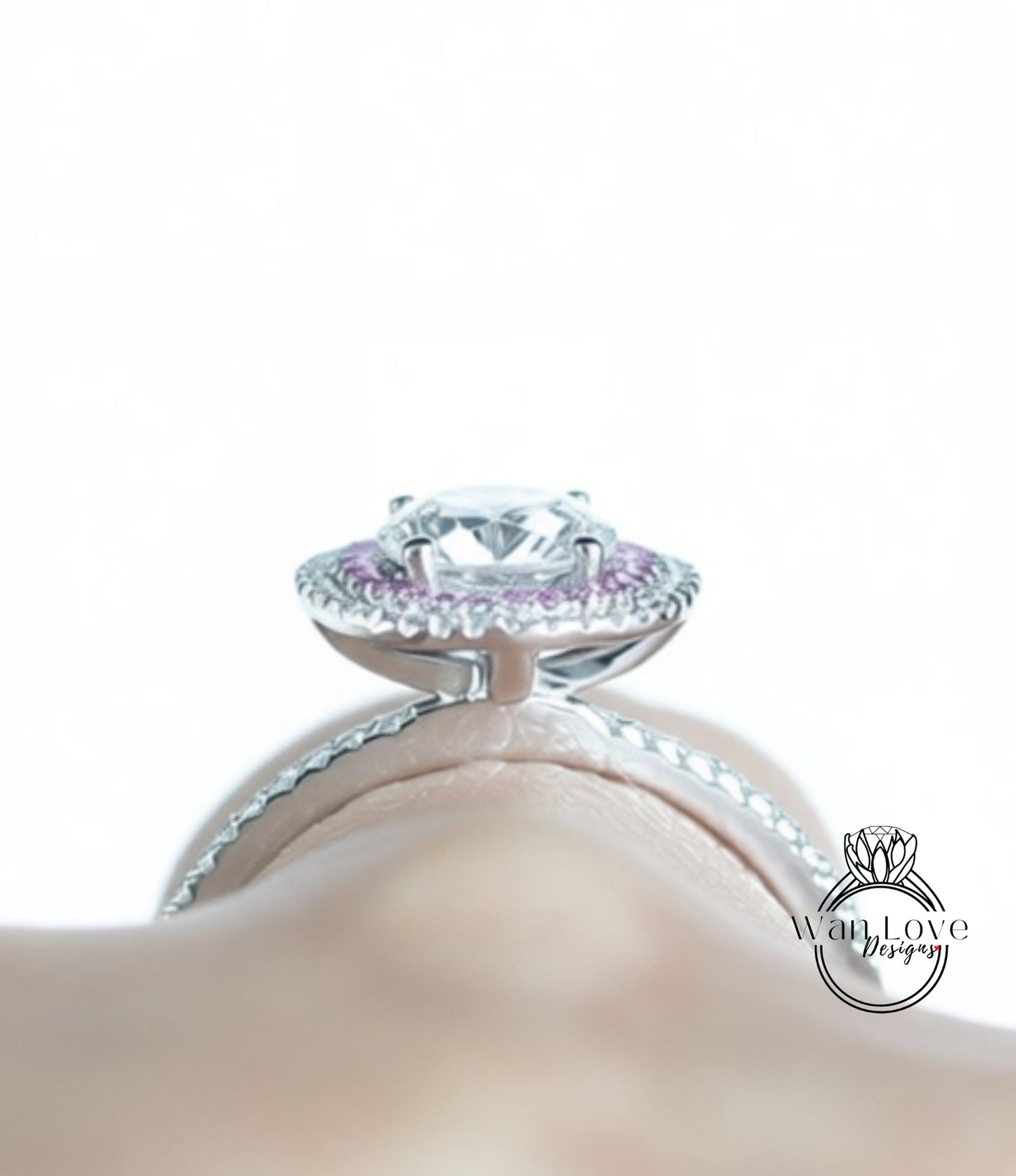 A close-up view of a diamond ring with a large central diamond surrounded by smaller diamonds and a halo of smaller diamonds.