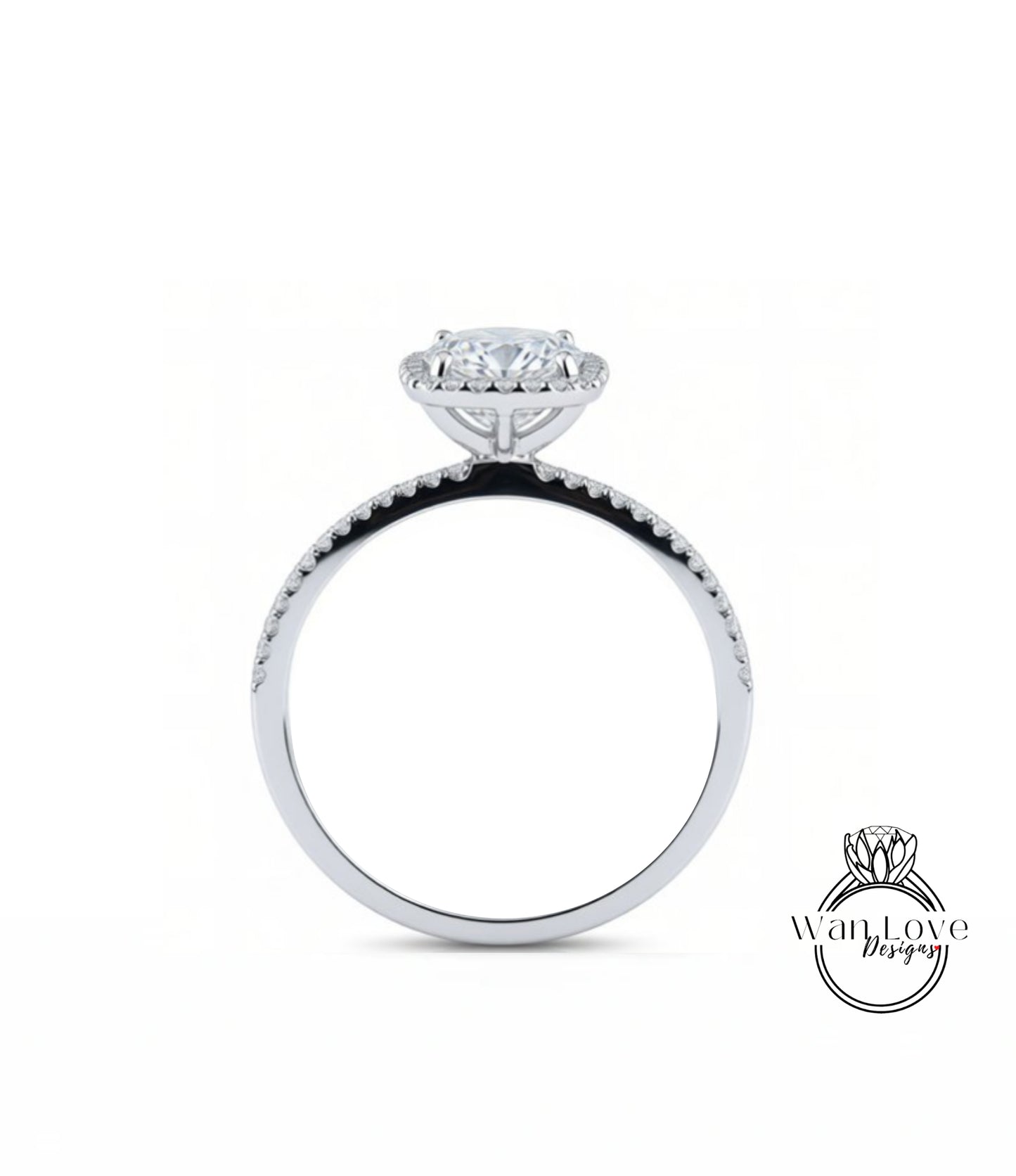 A silver engagement ring with a large central diamond and a halo of smaller diamonds around the top.