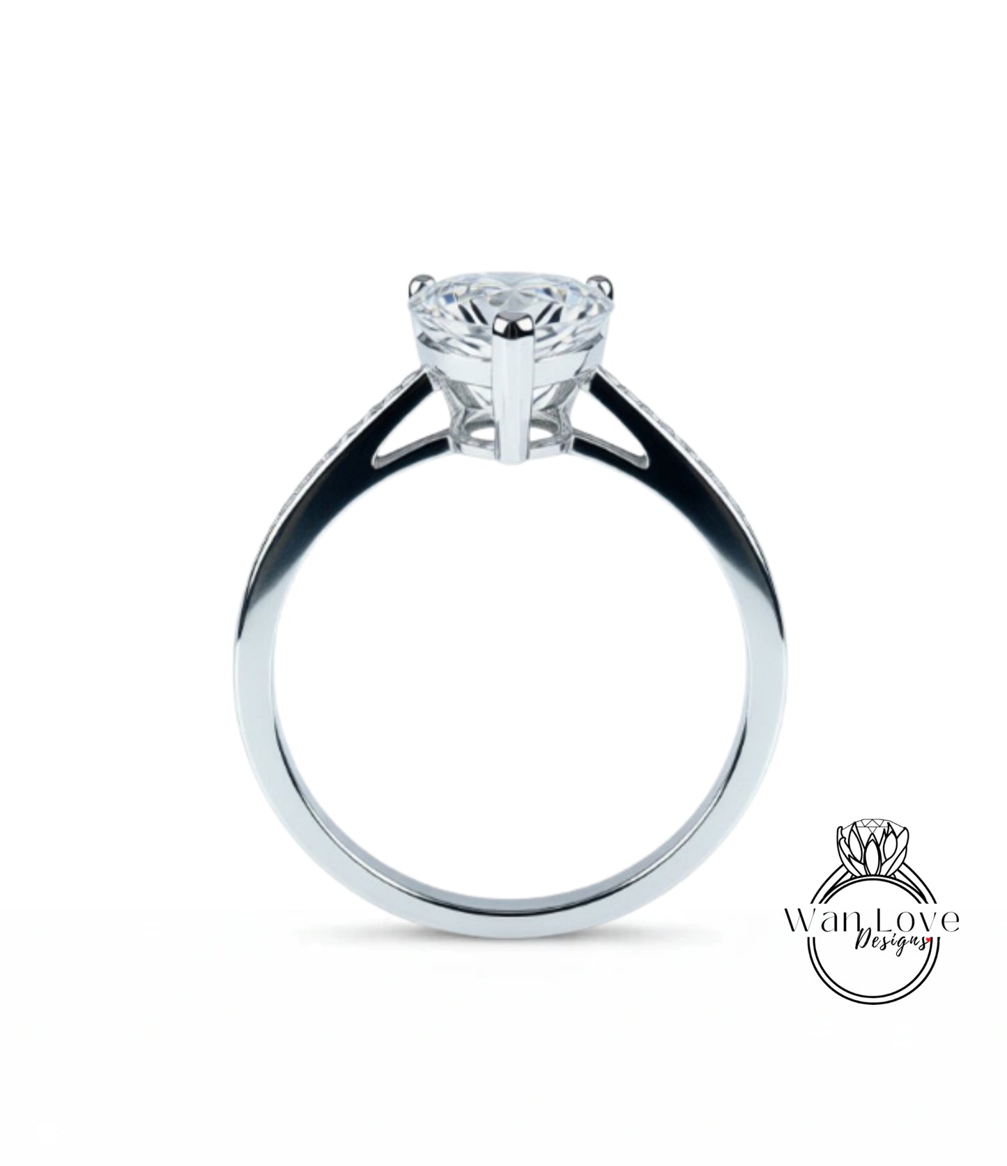 A silver engagement ring with a large diamond set in the center.