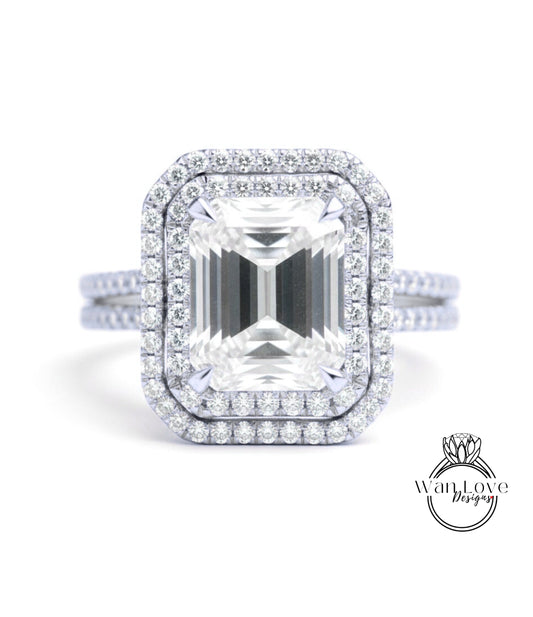 A stunning diamond engagement ring with a large, brilliant-cut diamond set in a halo of smaller diamonds, surrounded by a halo of smaller diamonds.