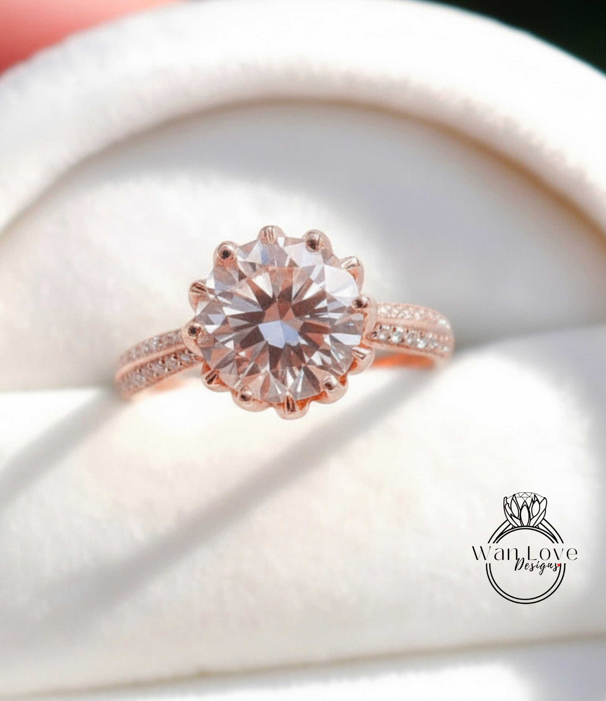 A close-up image of a beautiful rose gold engagement ring with a large, round diamond set in the center, surrounded by smaller diamonds.