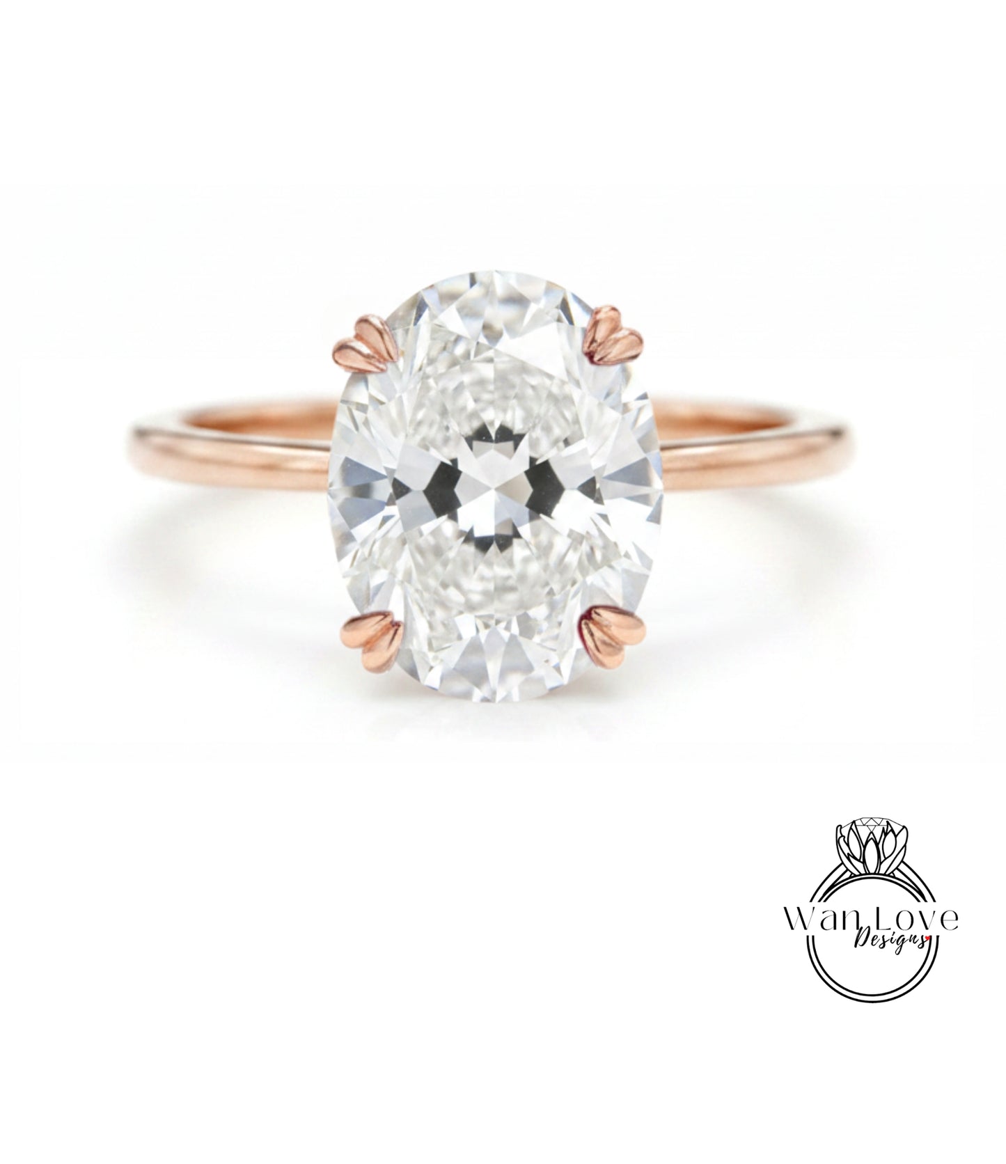 A close-up of a diamond engagement ring with a large oval-shaped diamond set in a rose gold band.