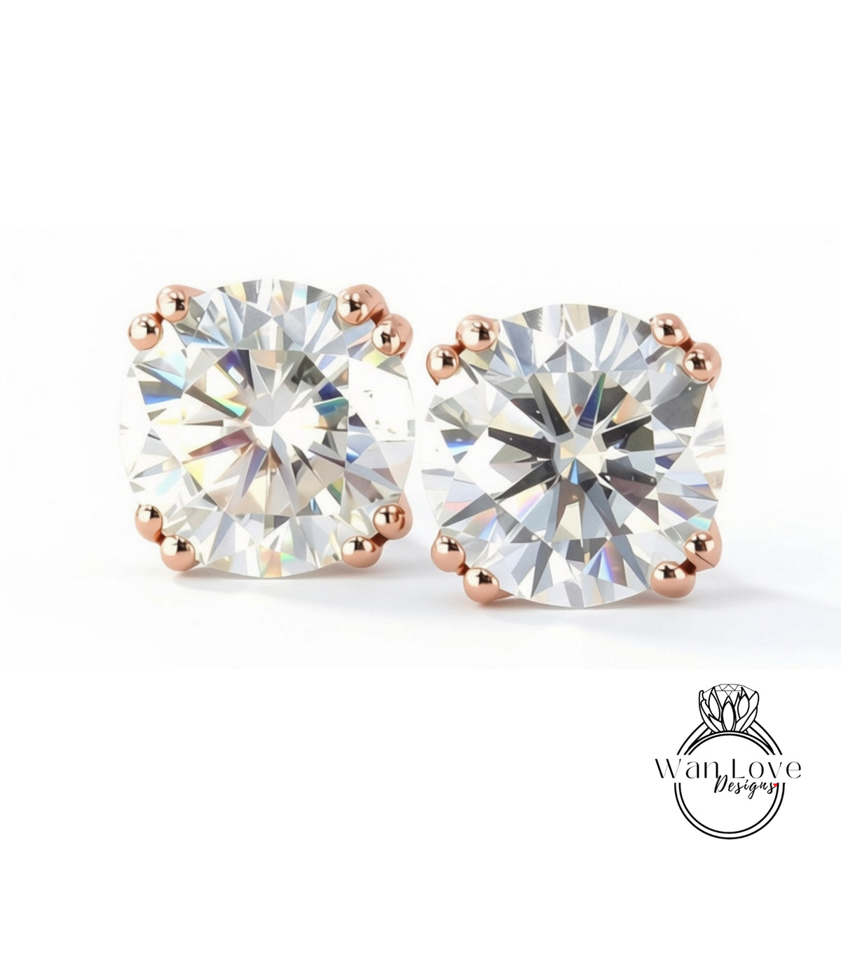 two large, clear gemstones with a metallic rose design, set in a simple, elegant gold-toned earring.