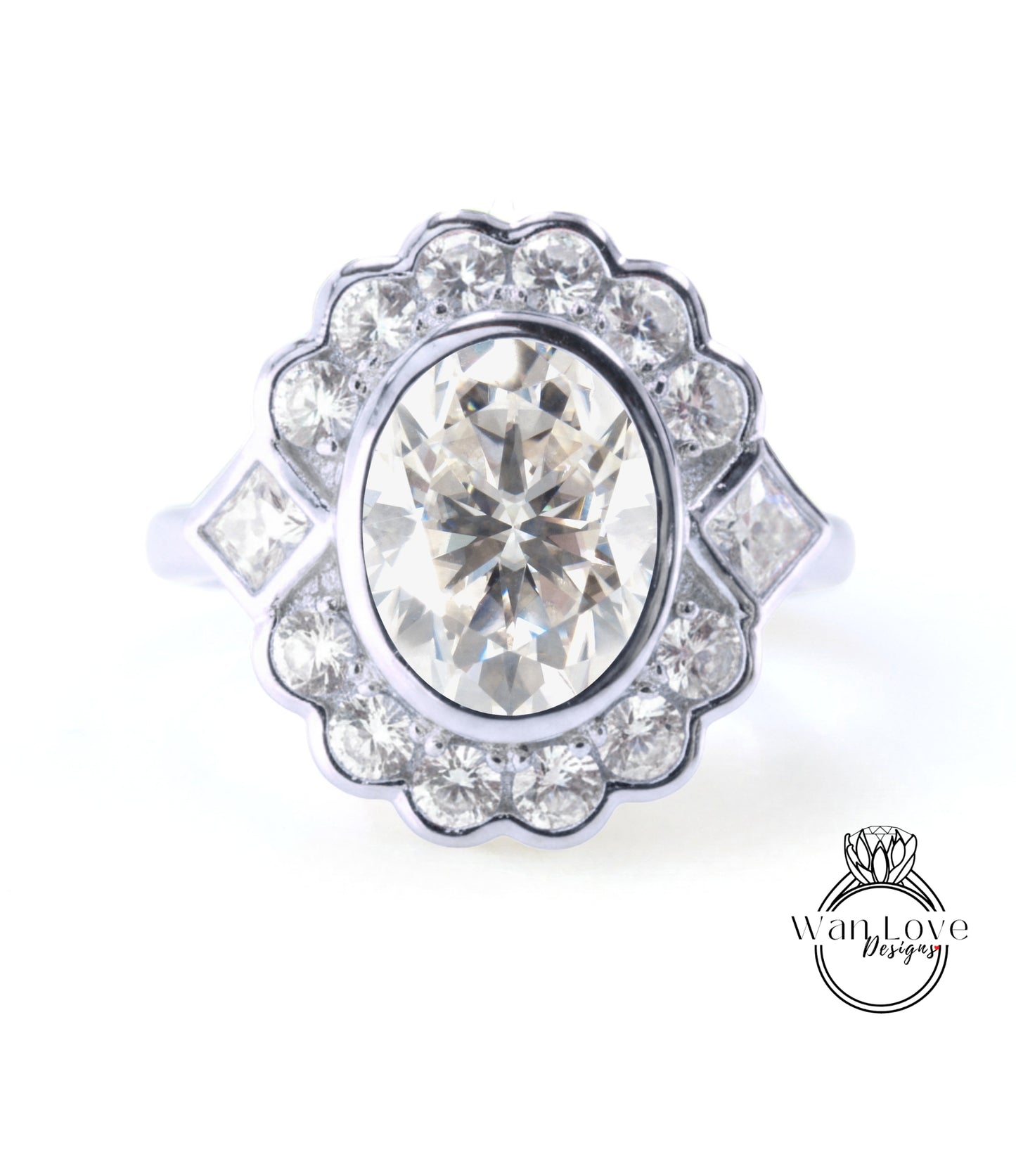 A stunning diamond engagement ring with a large oval-shaped diamond at the center, surrounded by smaller diamonds and set in a silver band.