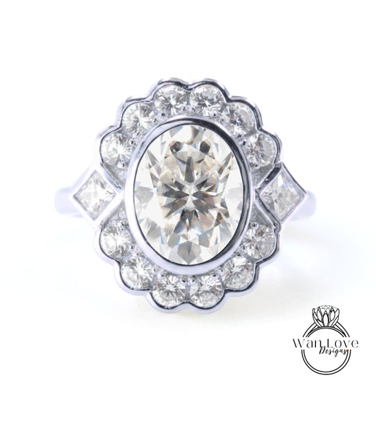 A stunning diamond engagement ring with a large oval-shaped diamond at the center, surrounded by smaller diamonds and set in a silver band.