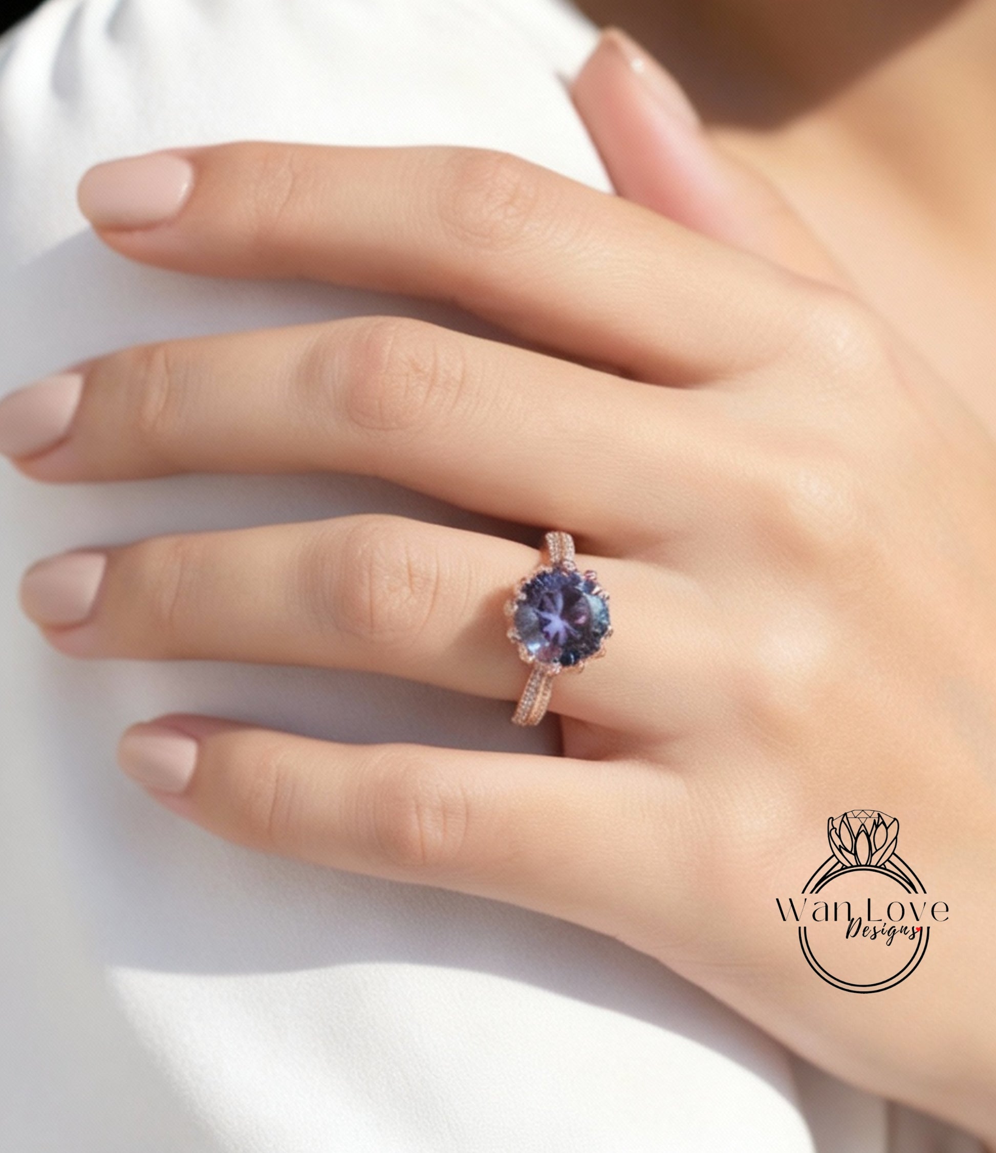 A close-up of a person's hand wearing a ring with a large purple gemstone.