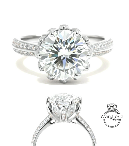 A stunning diamond engagement ring with a large round brilliant cut diamond set in a silver band adorned with small diamonds.
