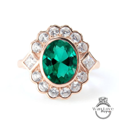 A gold ring with a large oval-shaped gemstone at the center, surrounded by smaller diamonds.