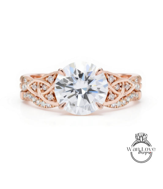 a beautiful engagement ring with a large, brilliant-cut diamond set in a rose gold band adorned with small diamonds.