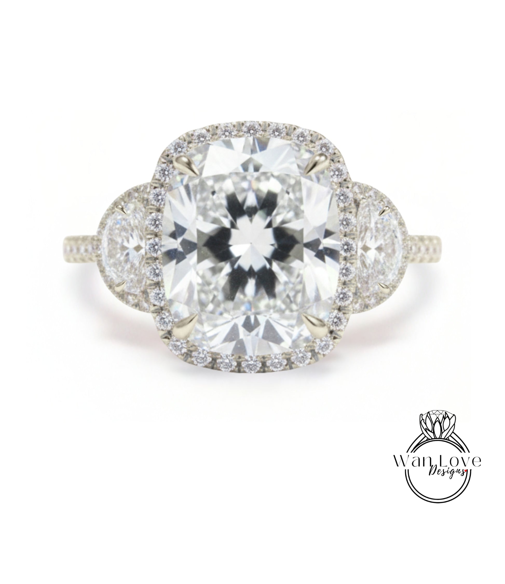 A stunning diamond engagement ring with a large central diamond surrounded by smaller diamonds on either side, set in a halo of smaller diamonds.