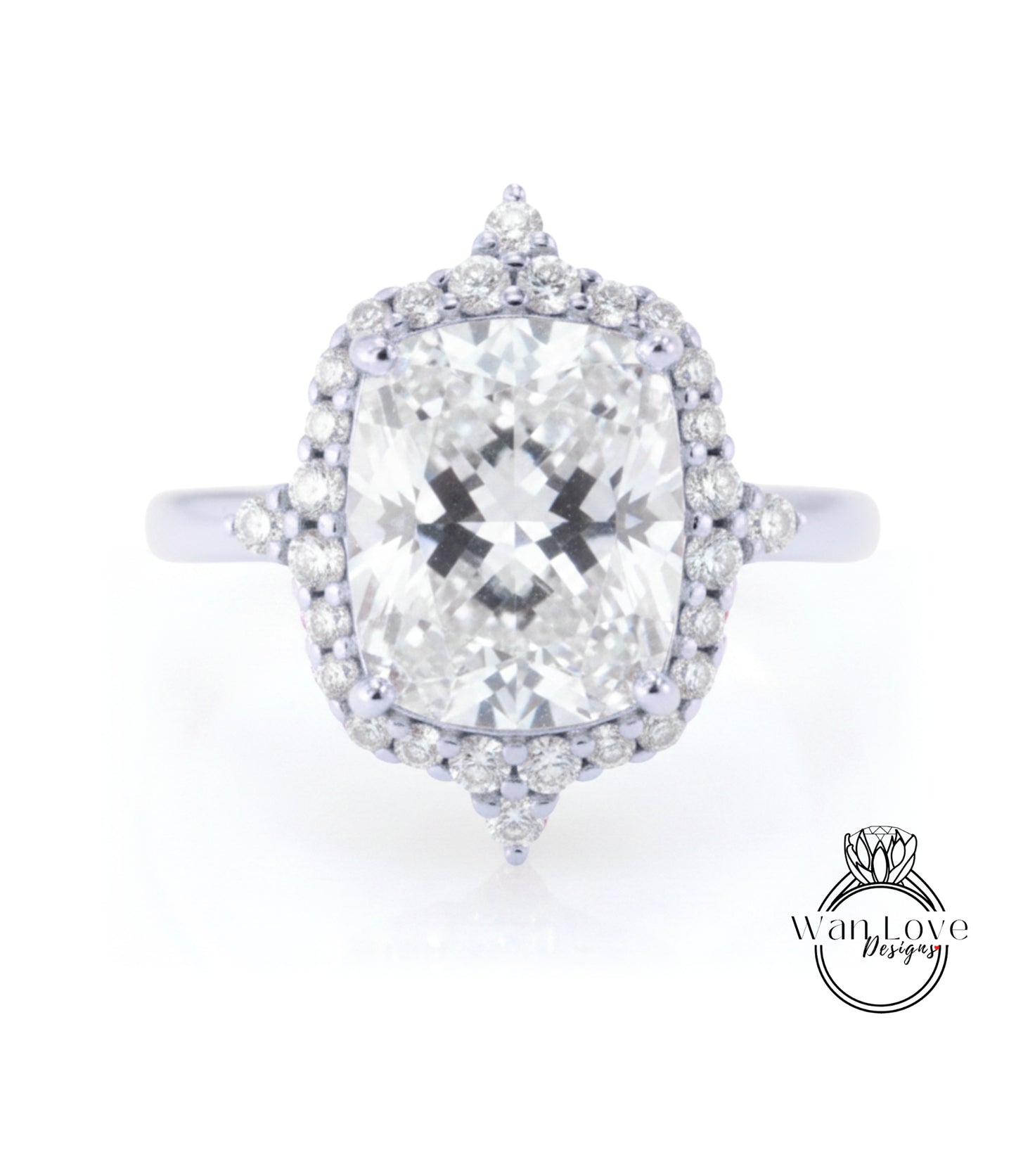 A large, round diamond engagement ring with a halo of smaller diamonds around the center stone.
