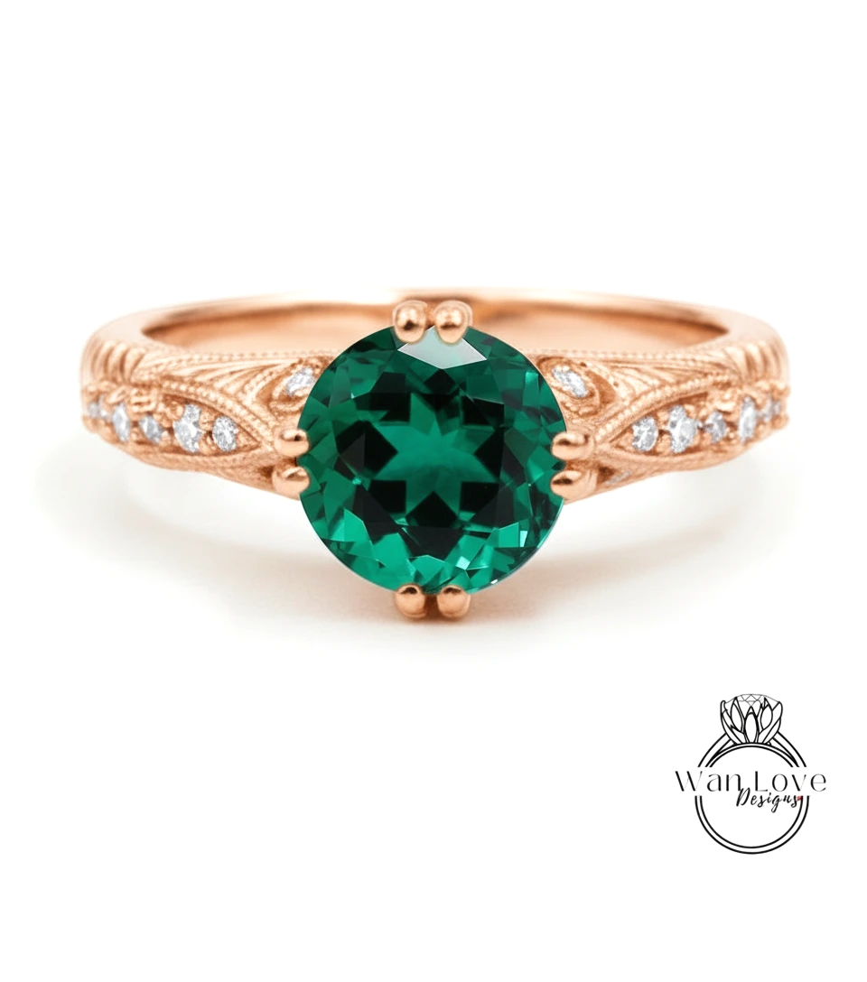 a beautiful engagement ring with a large, round green gemstone set in a rose gold band.