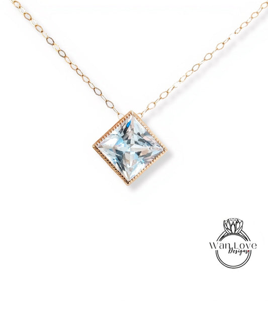 A necklace with a large, clear gemstone pendant in the center.
