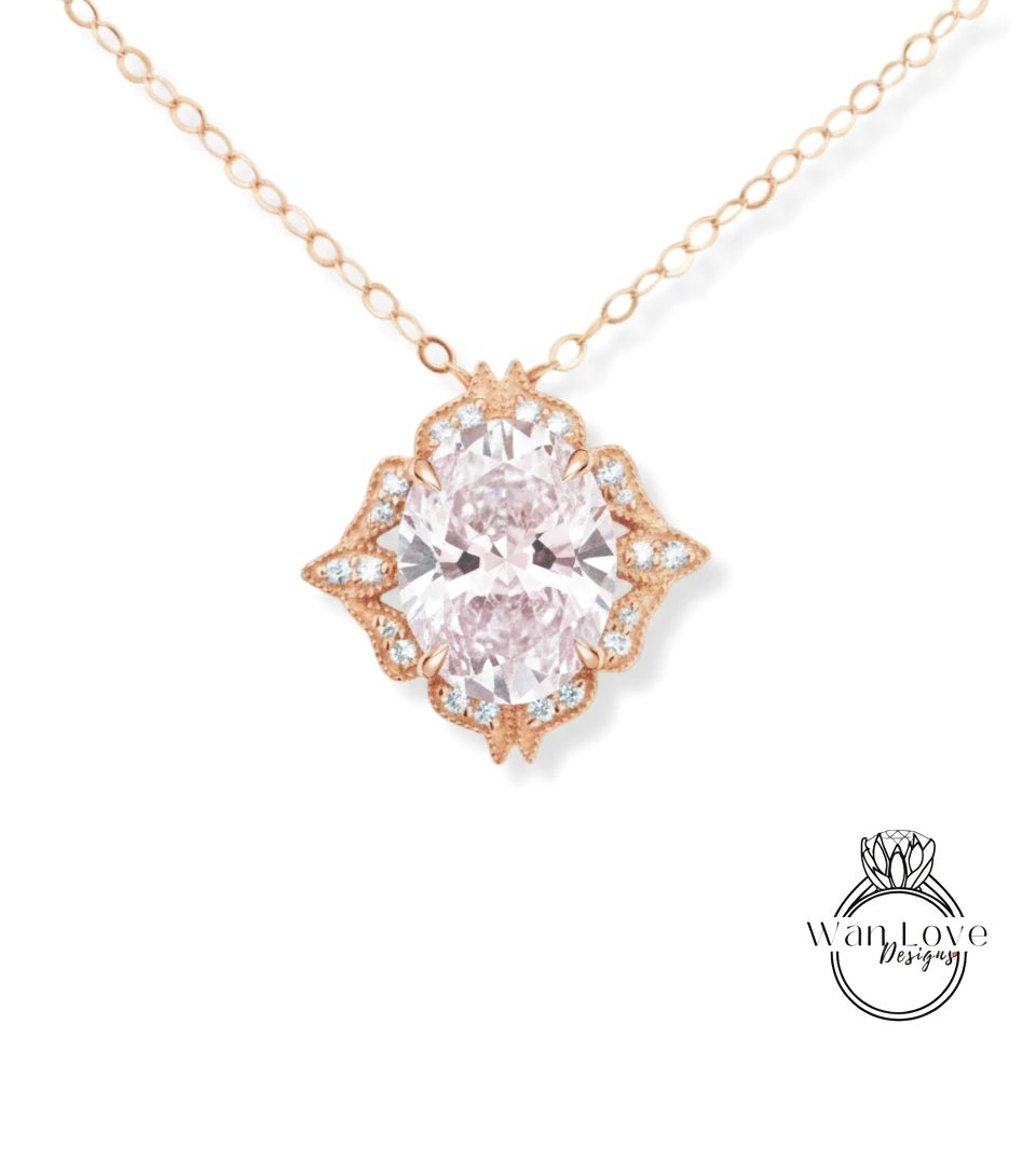 A necklace with a large oval-shaped pink diamond as the centerpiece, surrounded by smaller diamonds and a decorative floral design.