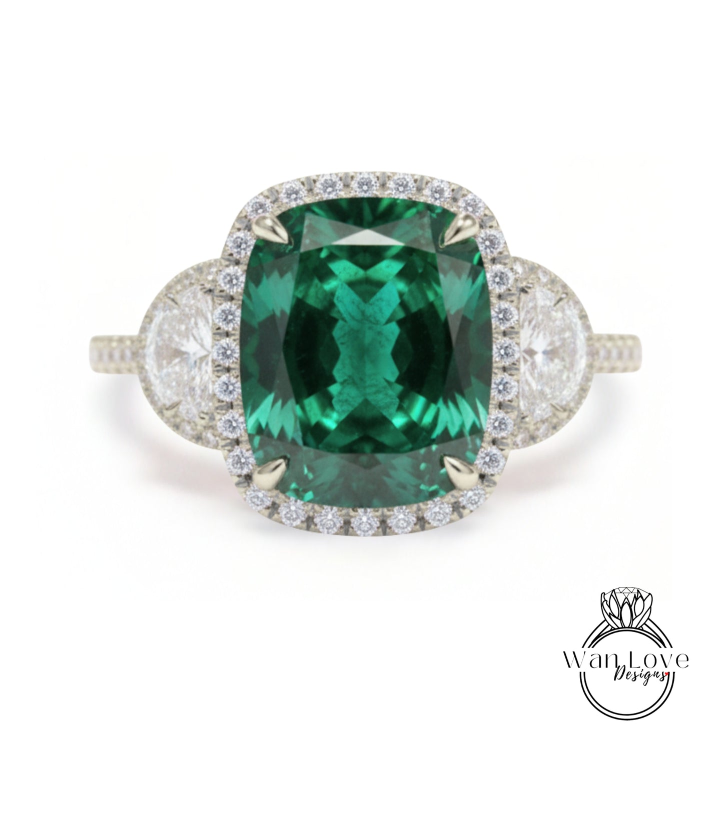 A stunning ring featuring a large, vibrant green gemstone surrounded by a halo of smaller diamonds, set in a silver band.