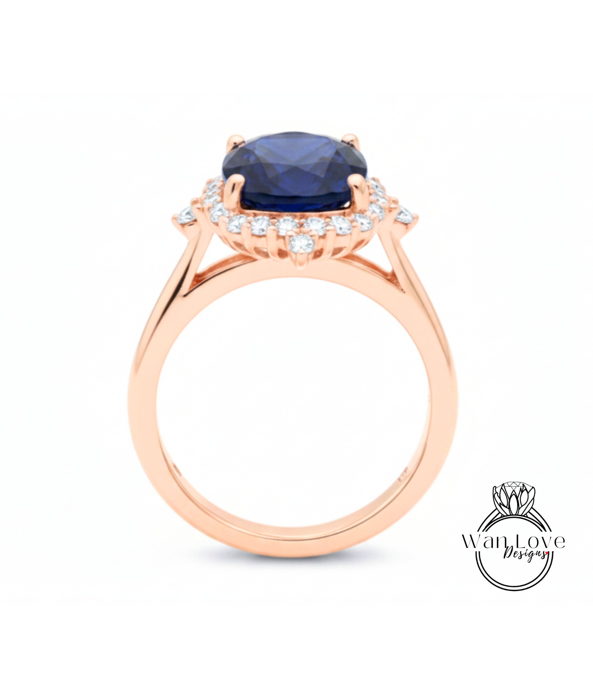 A rose gold ring with a large blue gemstone set in the center, surrounded by smaller diamonds.