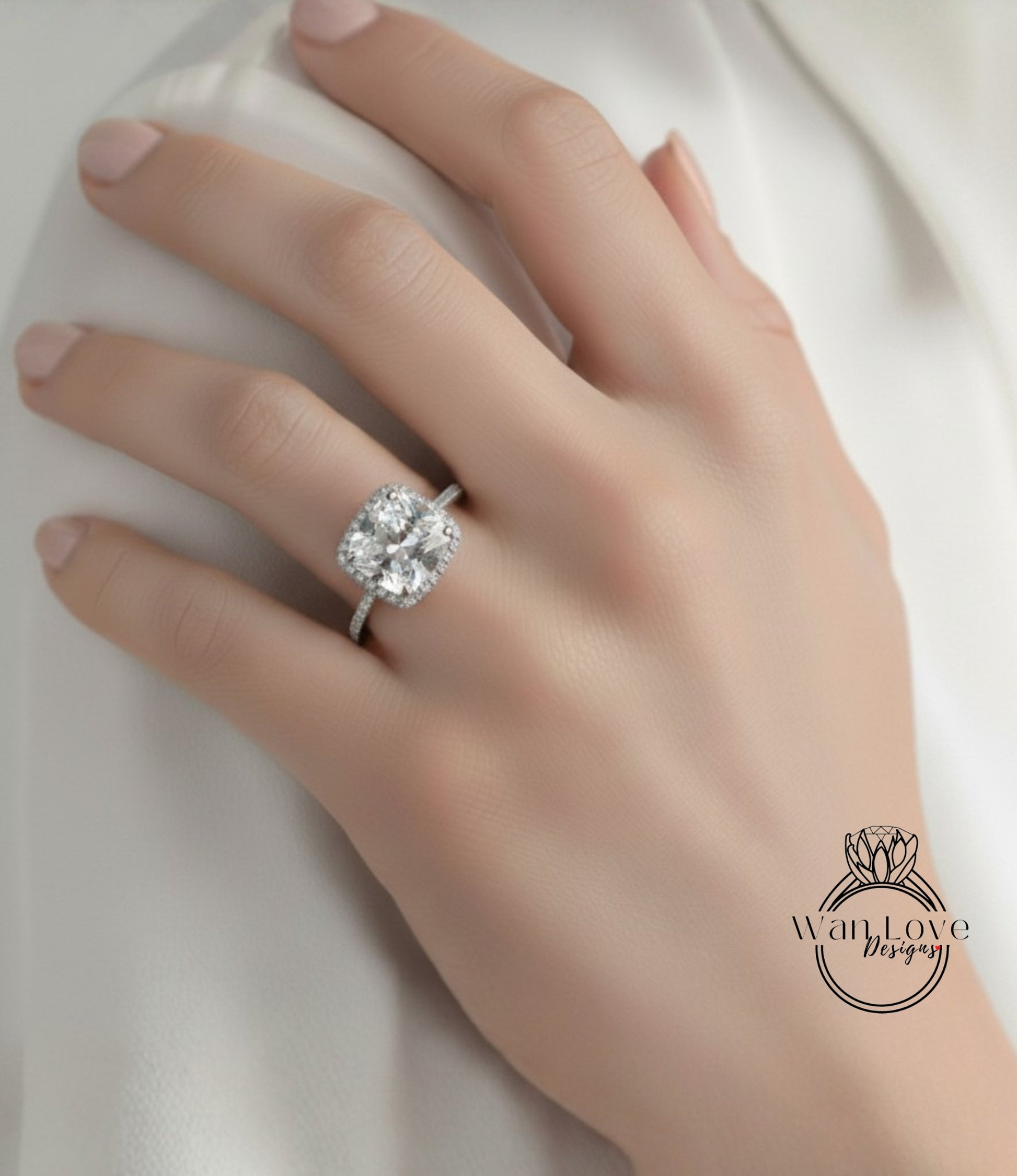 A close-up of a hand wearing a large diamond engagement ring.