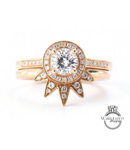 A gold ring with a large central diamond surrounded by smaller diamonds, and a star-shaped accent piece.