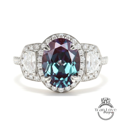 A stunning engagement ring with a large oval-shaped gemstone surrounded by smaller diamonds, set in a silver band.