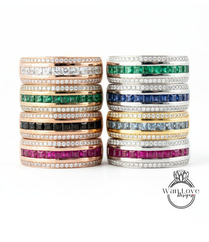 A collection of rings with various gemstones and designs, including diamonds and colored stones, arranged in a visually appealing manner.