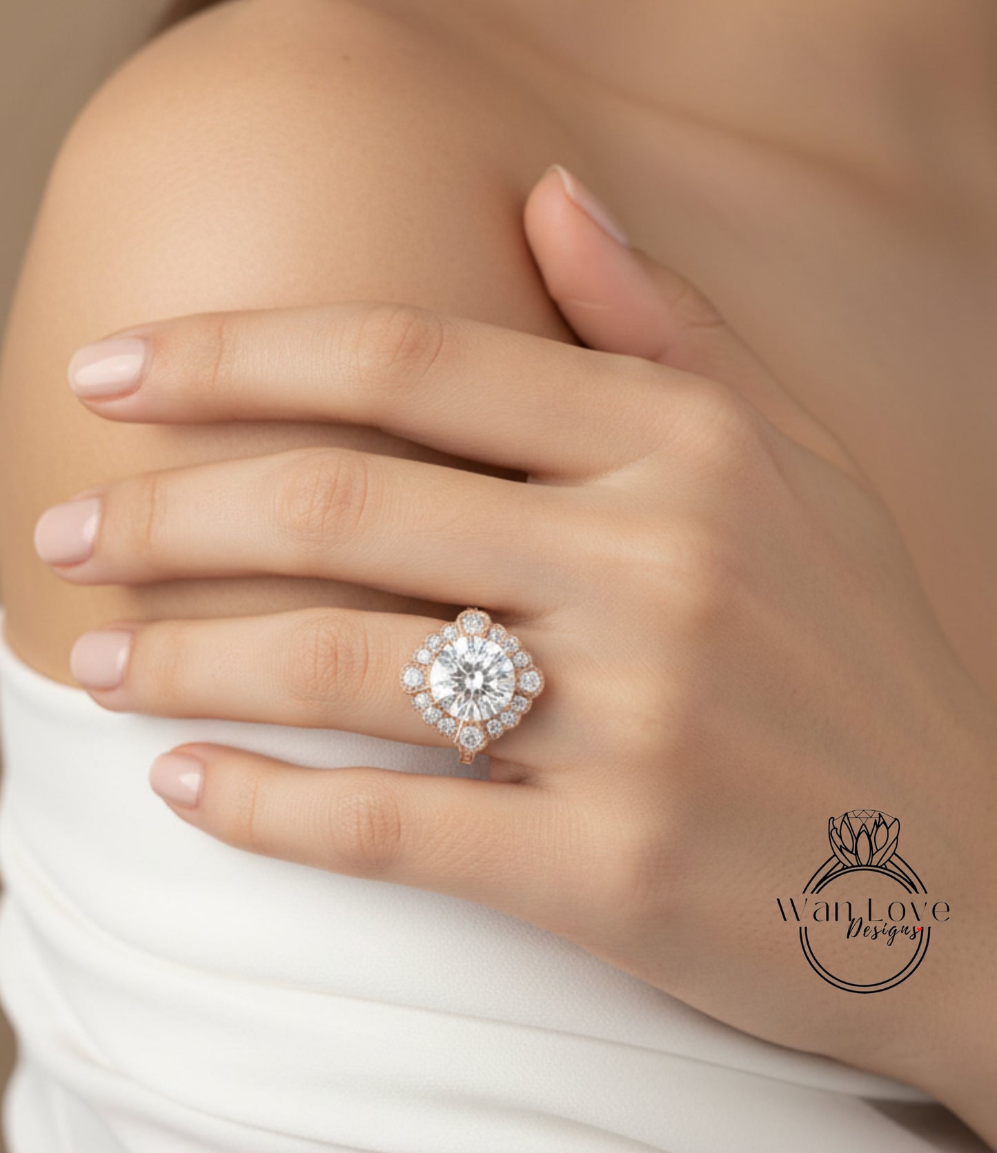 A close-up of a person's hand wearing a large, ornate diamond ring on the ring finger.