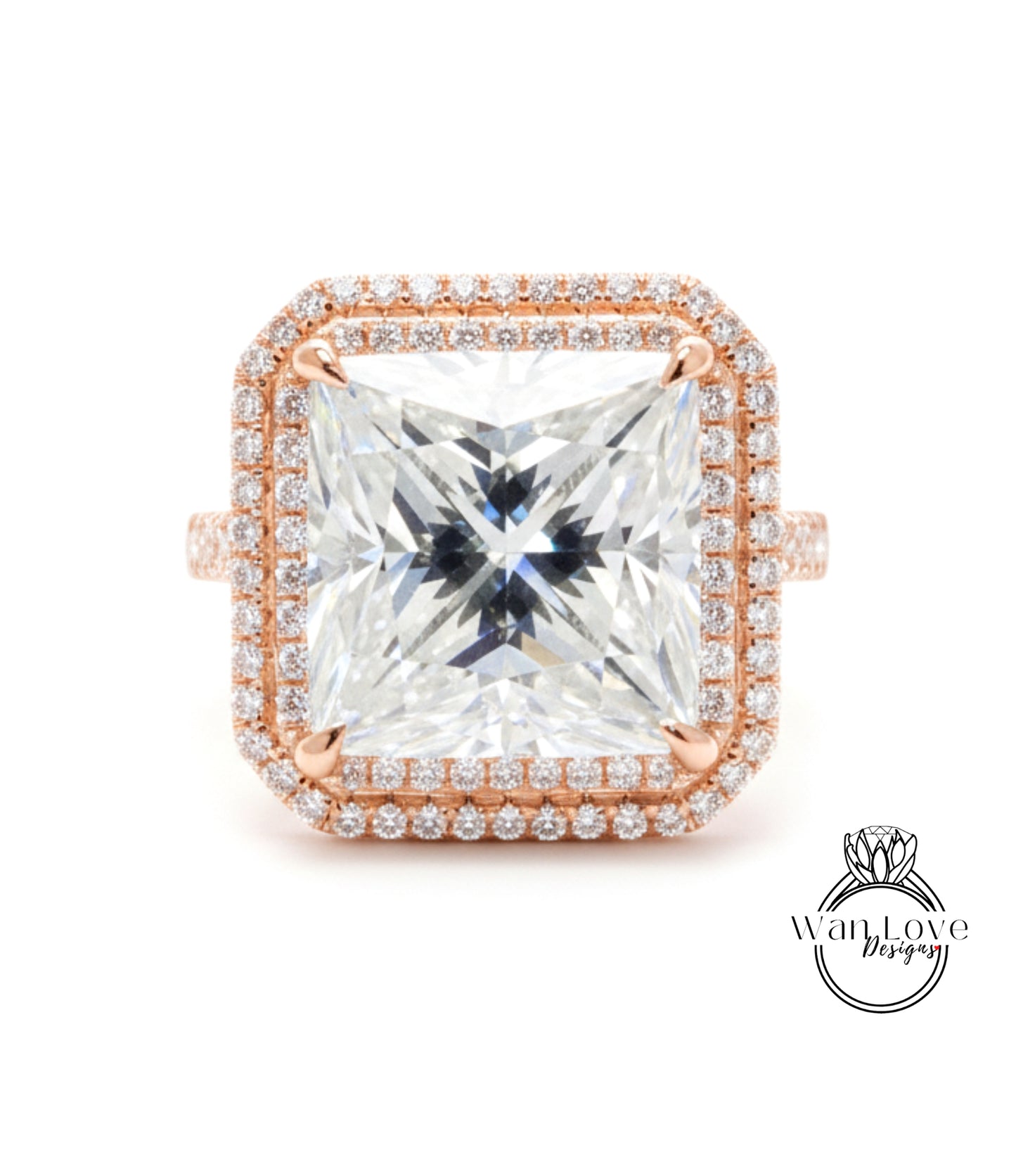 A large, square diamond ring with a halo of smaller diamonds around the edges, set in a rose gold band.
