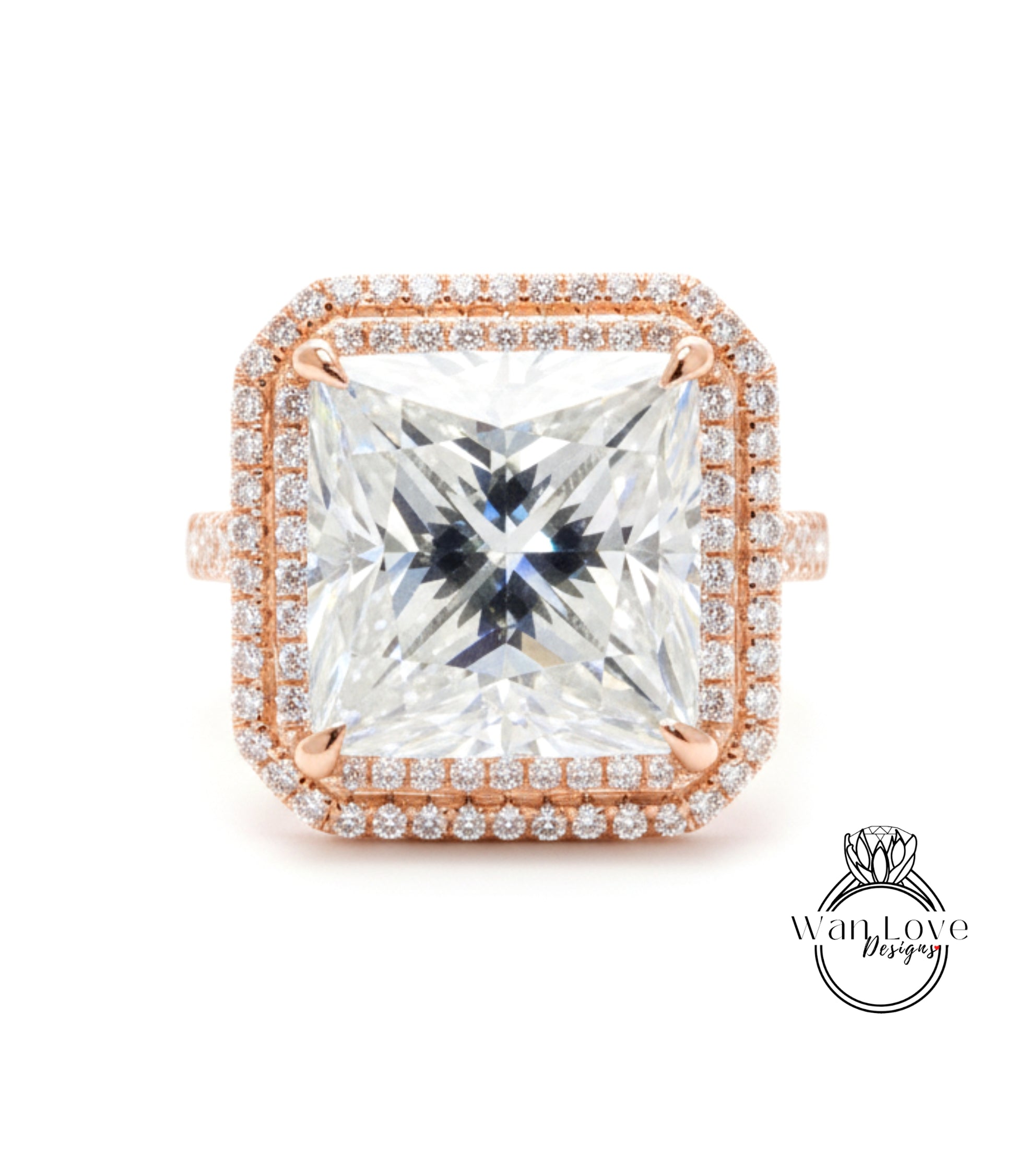 A large, square diamond ring with a halo of smaller diamonds around the edges, set in a rose gold band.