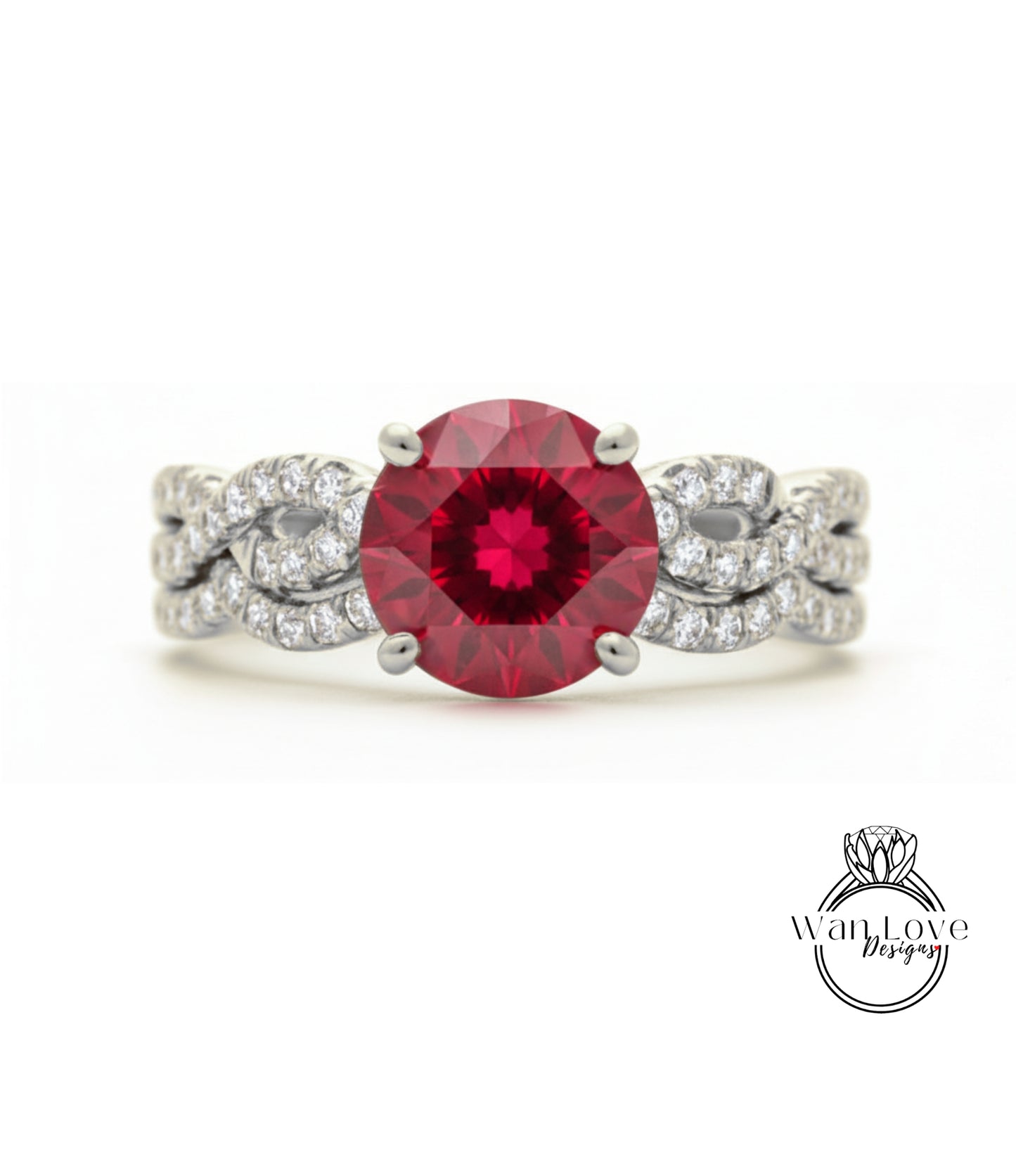 A stunning engagement ring with a large, deep red gemstone set in a silver band adorned with smaller diamonds.