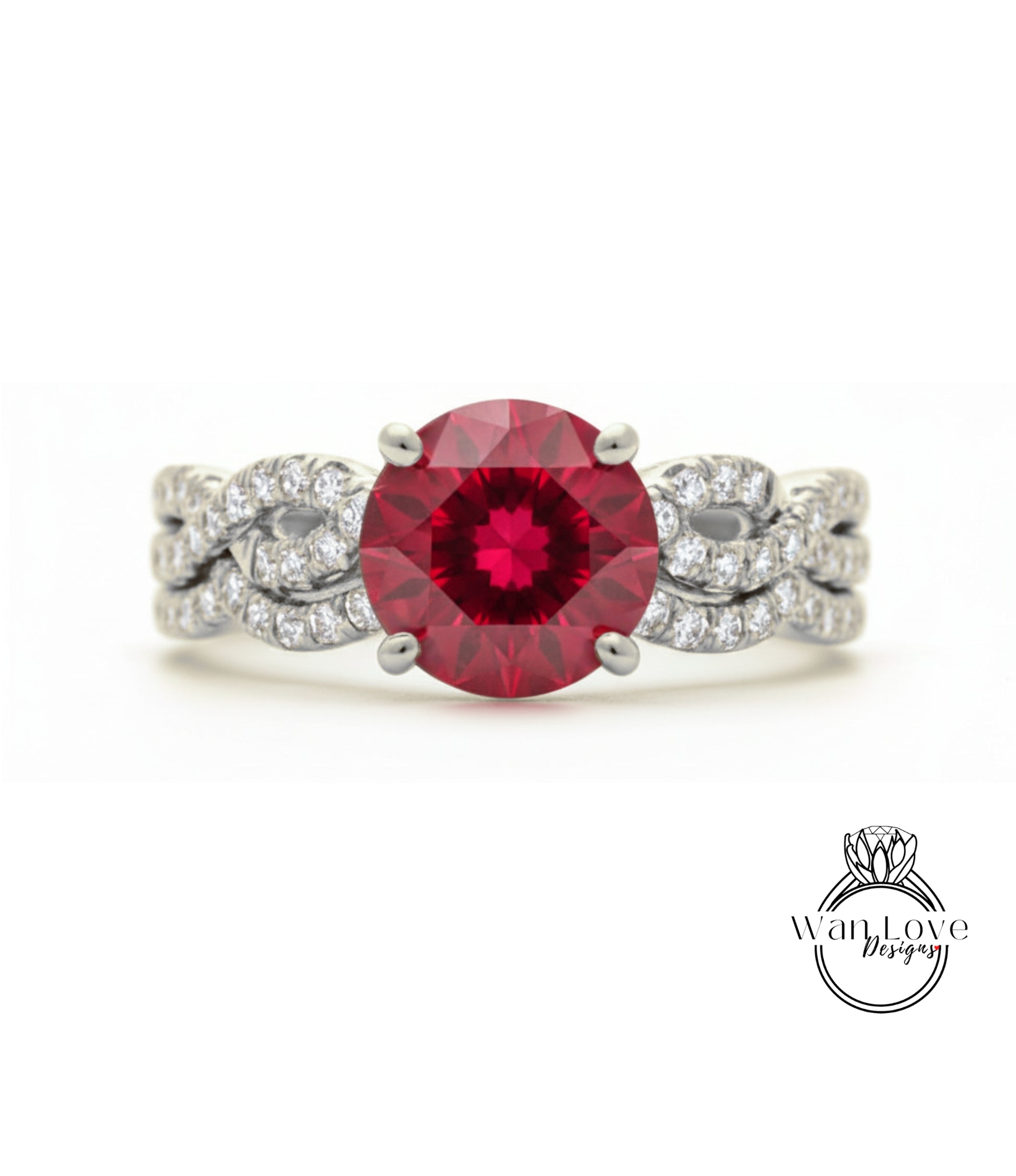 A stunning engagement ring with a large, deep red gemstone set in a silver band adorned with smaller diamonds.