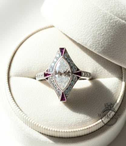 A diamond engagement ring is displayed in a white jewelry box, showcasing its intricate design and sparkling gemstones.