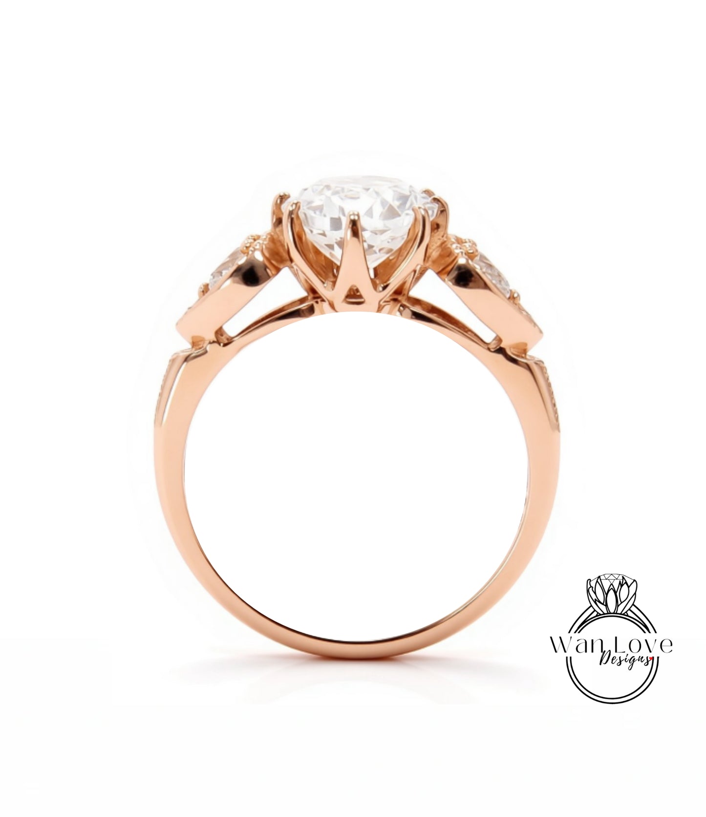 A close-up view of a gold ring with a large central diamond surrounded by smaller diamonds on either side.