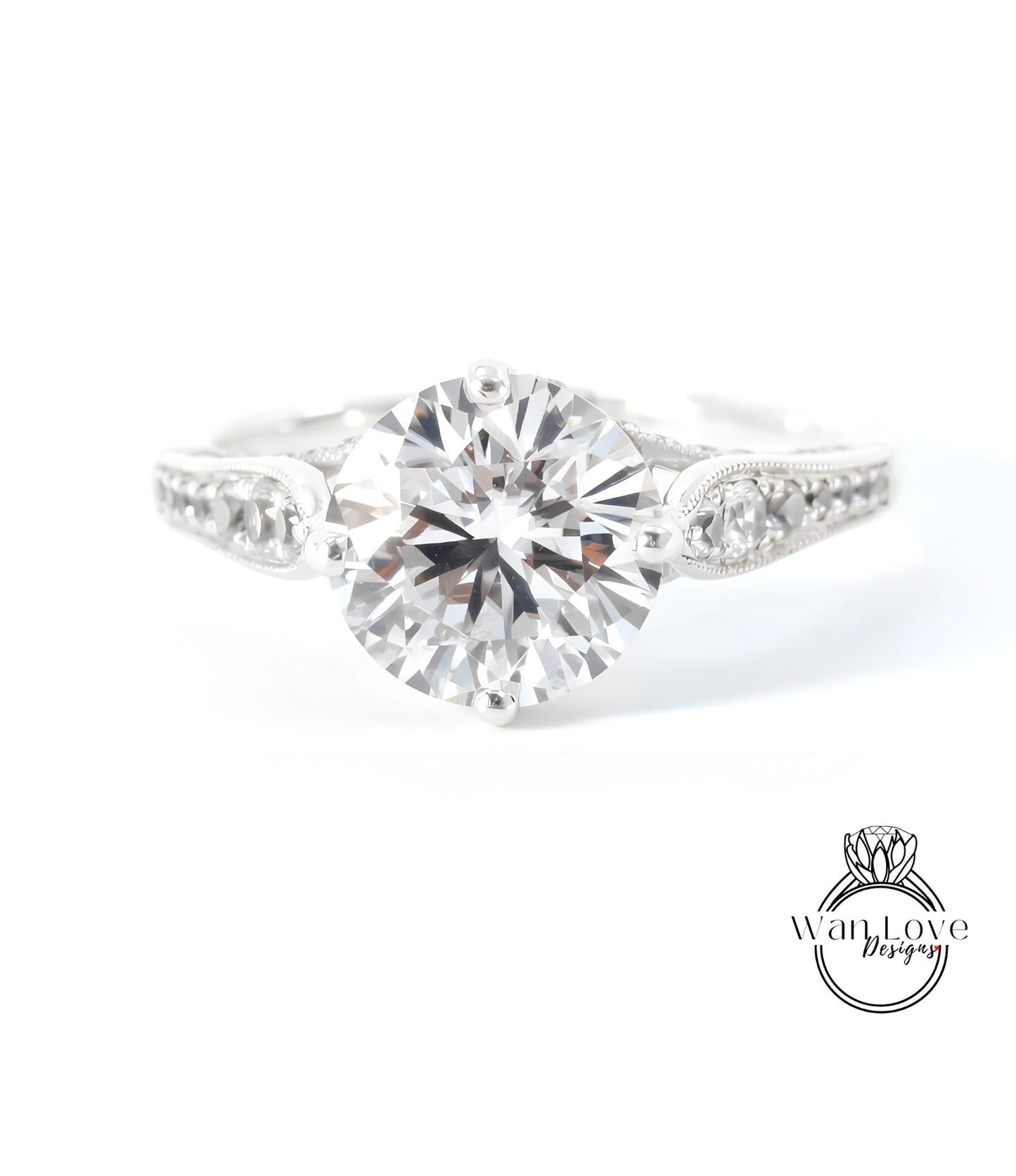 A close-up view of a diamond engagement ring with a large, brilliant-cut diamond set in a silver band.