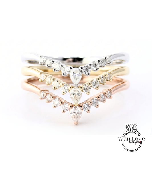 A close-up of a ring with three tiers of diamond-encrusted bands, showcasing the intricate design and craftsmanship of the jewelry.