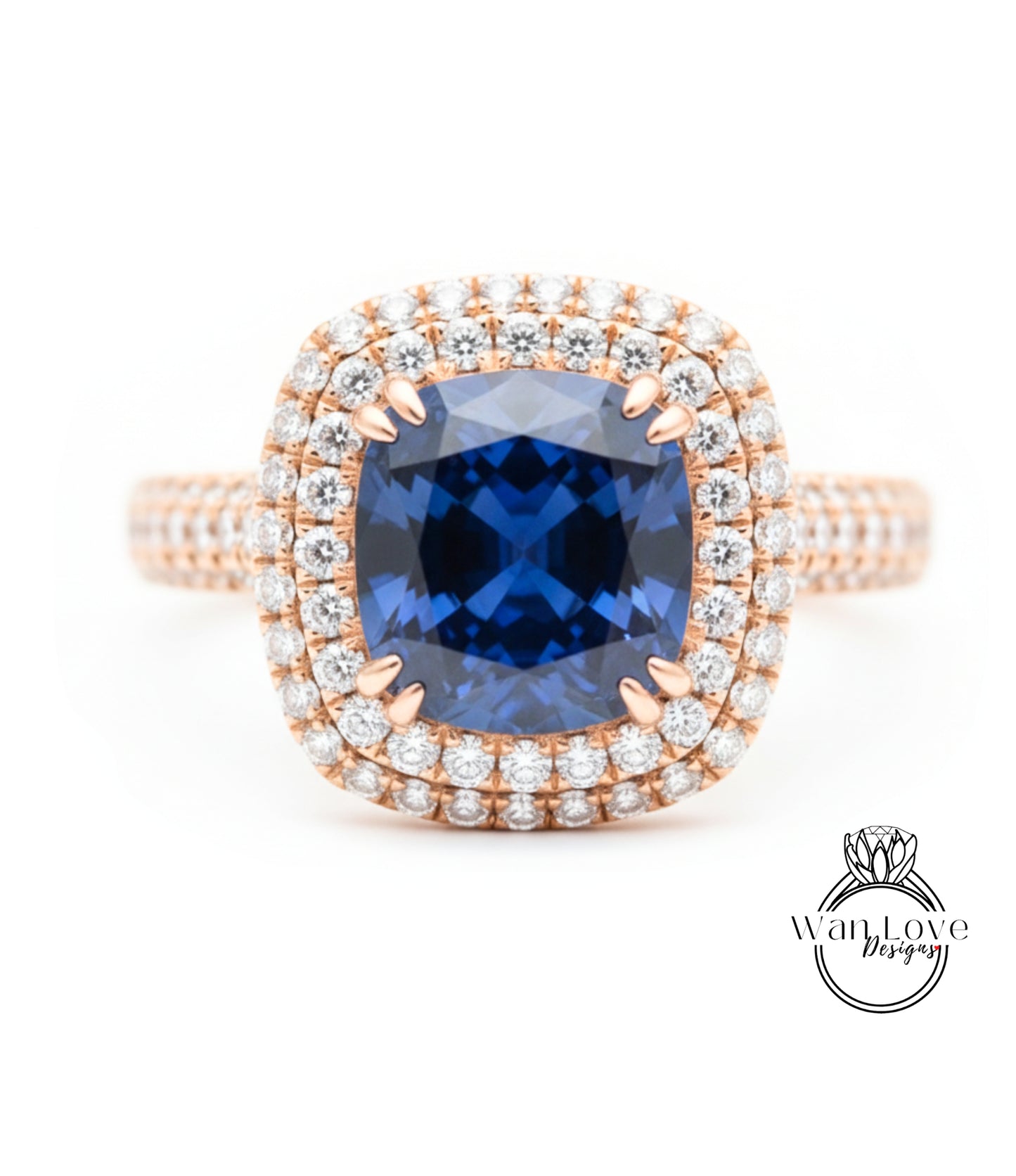 A stunning diamond ring with a large blue gemstone at the center, surrounded by a halo of smaller diamonds.