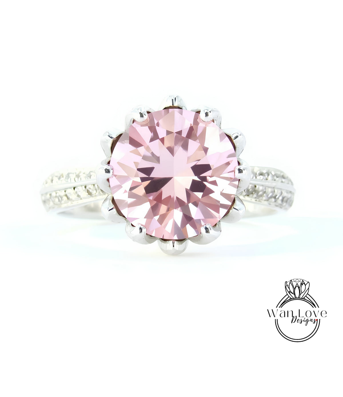 A close-up image of a beautiful pink gemstone ring with a large central gemstone surrounded by smaller stones.