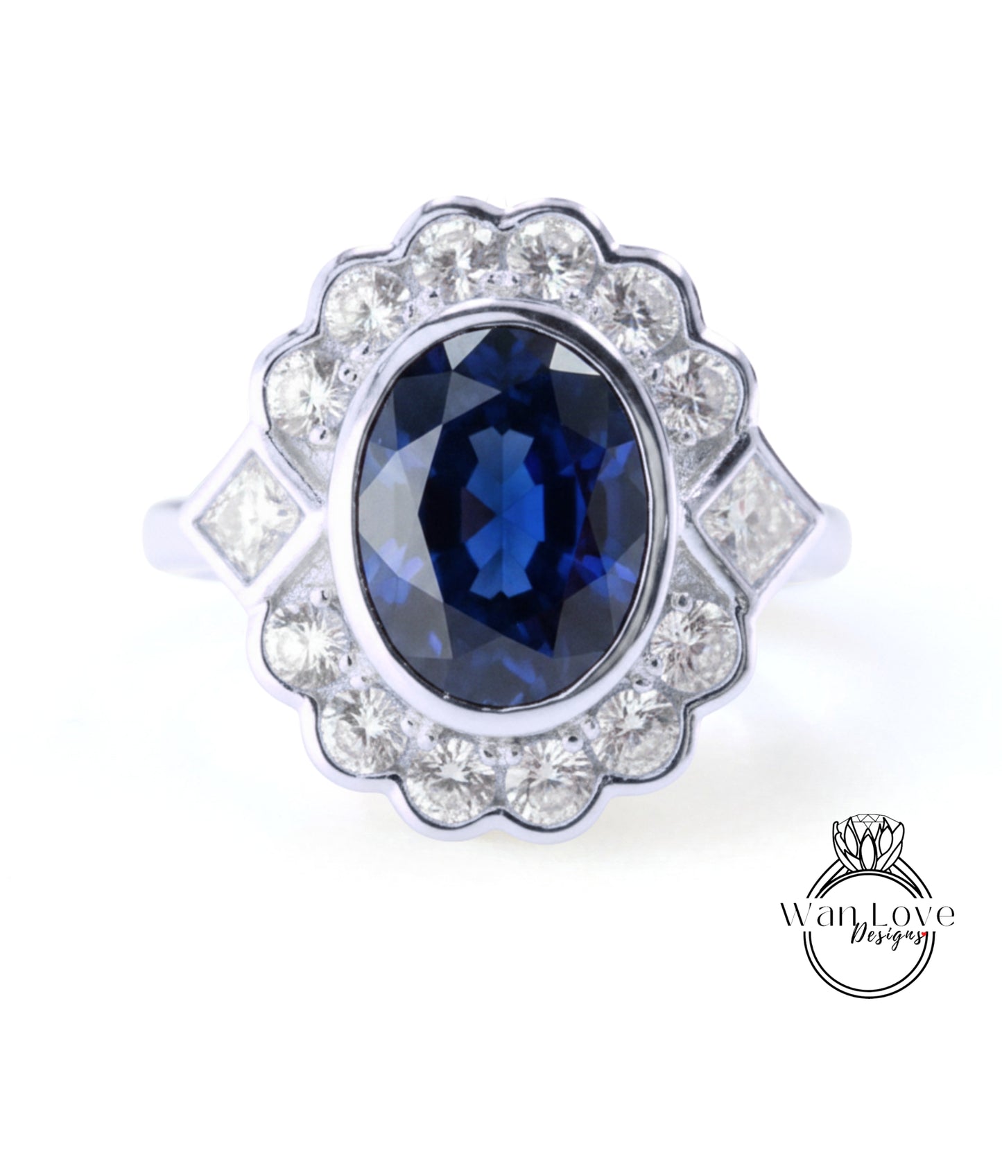 A stunning ring featuring a large oval-shaped blue gemstone surrounded by a scalloped design and sparkling diamonds.