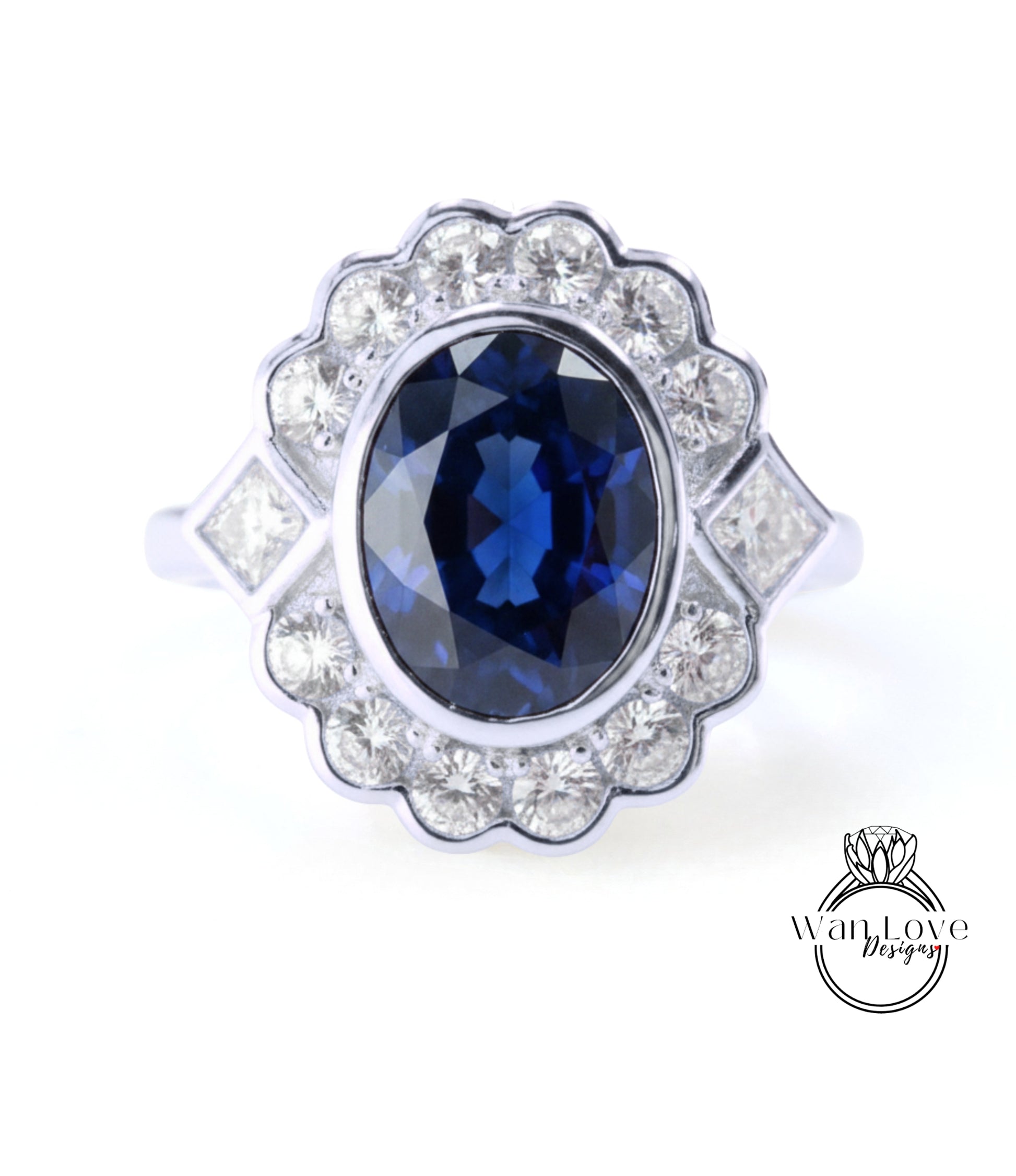 A stunning ring featuring a large oval-shaped blue gemstone surrounded by a scalloped design and sparkling diamonds.