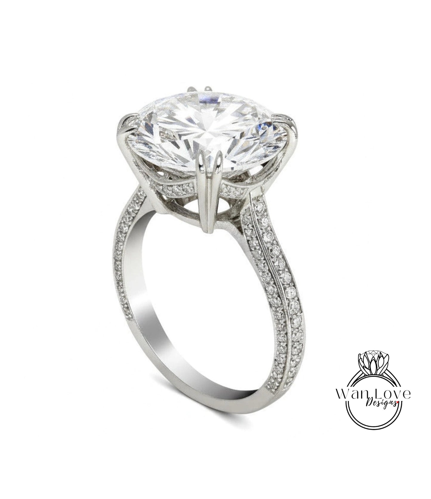 A large, sparkling diamond engagement ring with a prominent center stone and intricate metalwork detailing.