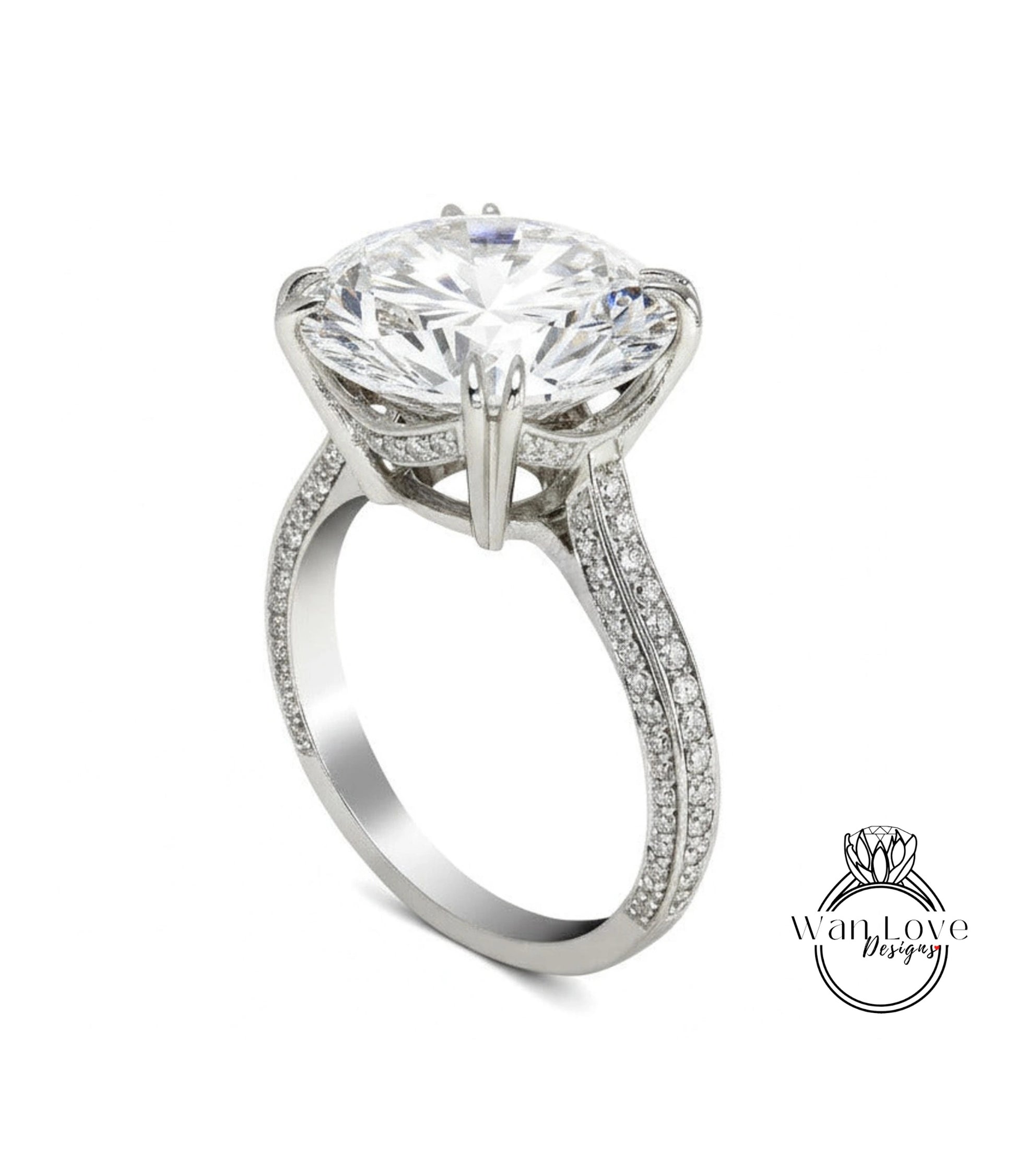 A large, sparkling diamond engagement ring with a prominent center stone and intricate metalwork detailing.