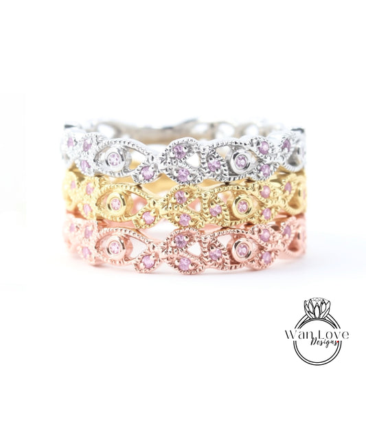 A ring with multiple layers of rings, each with a unique design and color. The rings are arranged in a circular pattern, creating a visually appealing and intricate design.