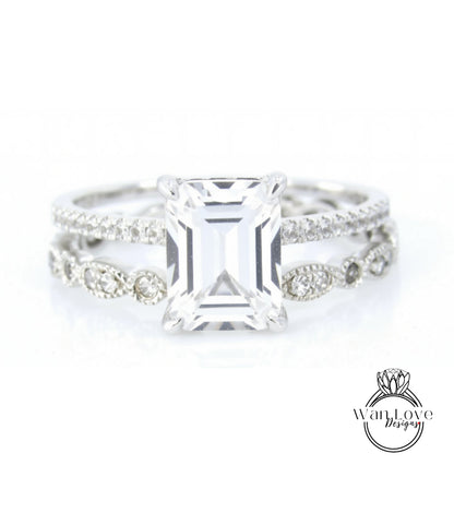 A close-up view of a diamond engagement ring with a large, clear gemstone set in a silver band.