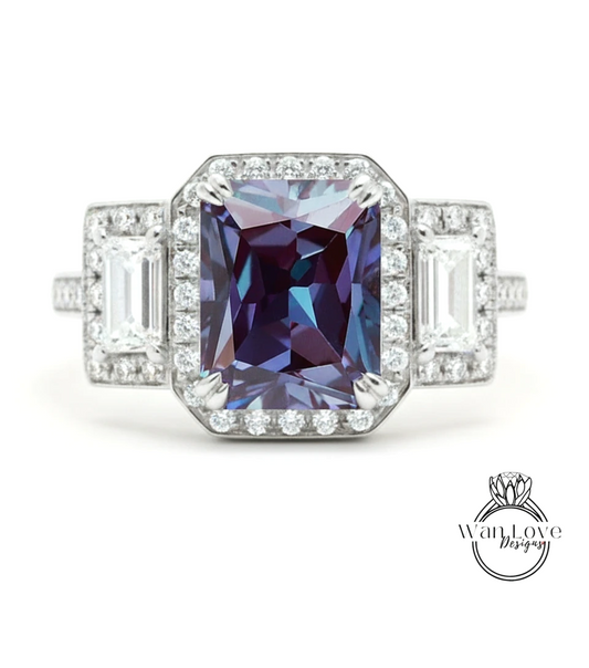 A stunning diamond engagement ring with a large, deep purple gemstone surrounded by smaller diamonds and set in a silver band.